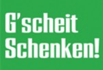 Weißer Schriftzug "G'scheit Schenken" auf grünem Hintergrund.